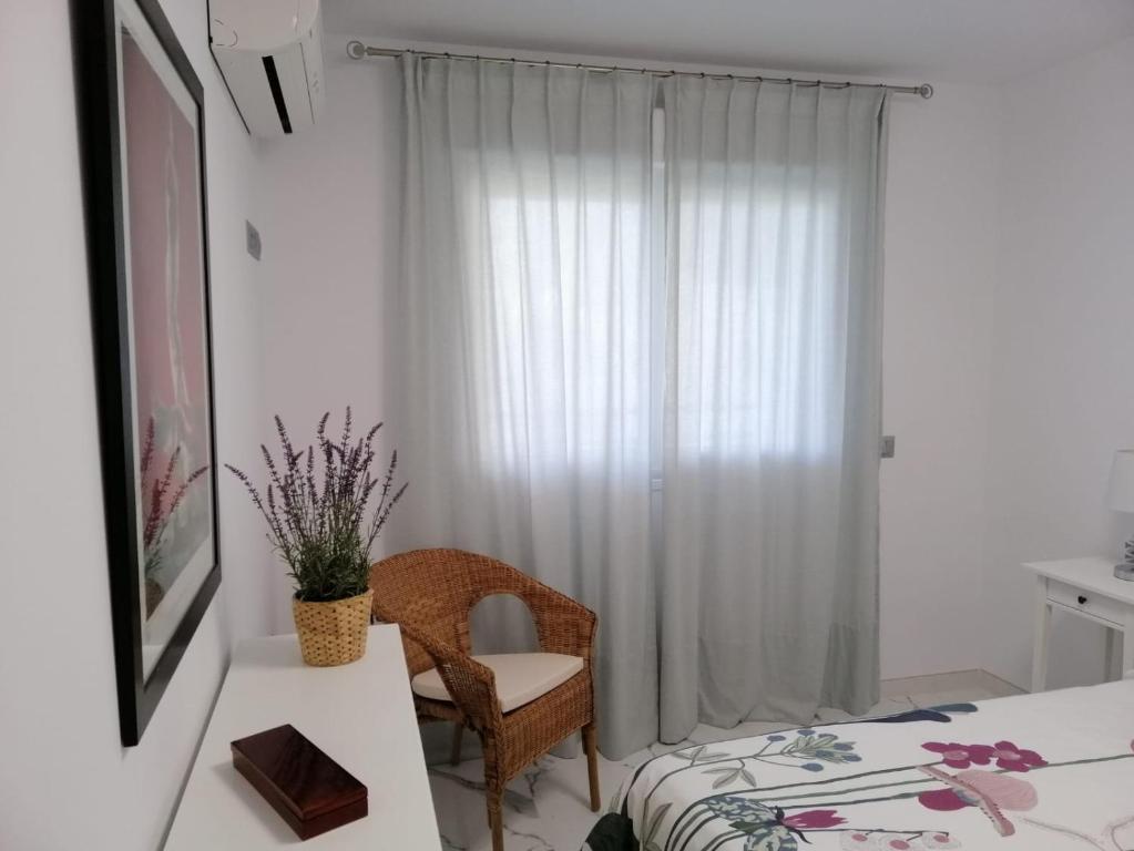 Postel nebo postele na pokoji v ubytování Apartamento 315 en paseo marítimo 96