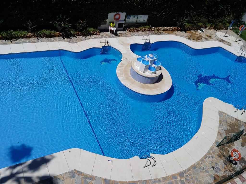 Bazén v ubytování Apartamento 315 en paseo marítimo 96 nebo v jeho okolí