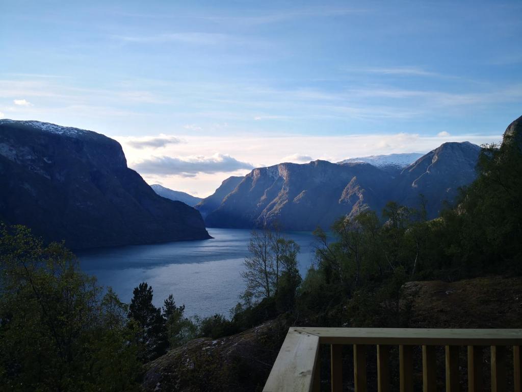 a view of a lake with mountains in the background at Winjum Cabin Aurland Stegastein in Aurland