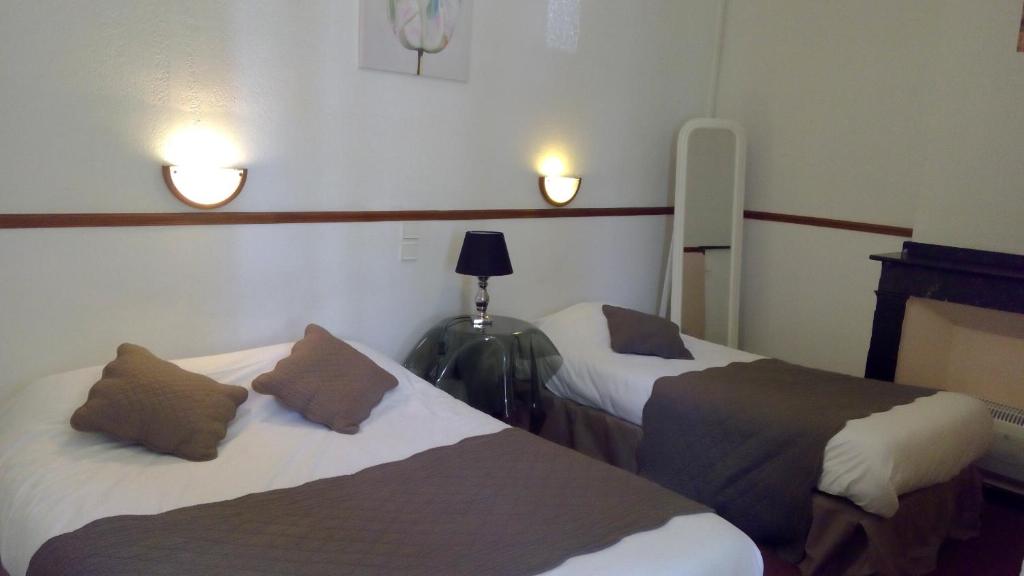 Hôtel Central - Chambre Quadruple