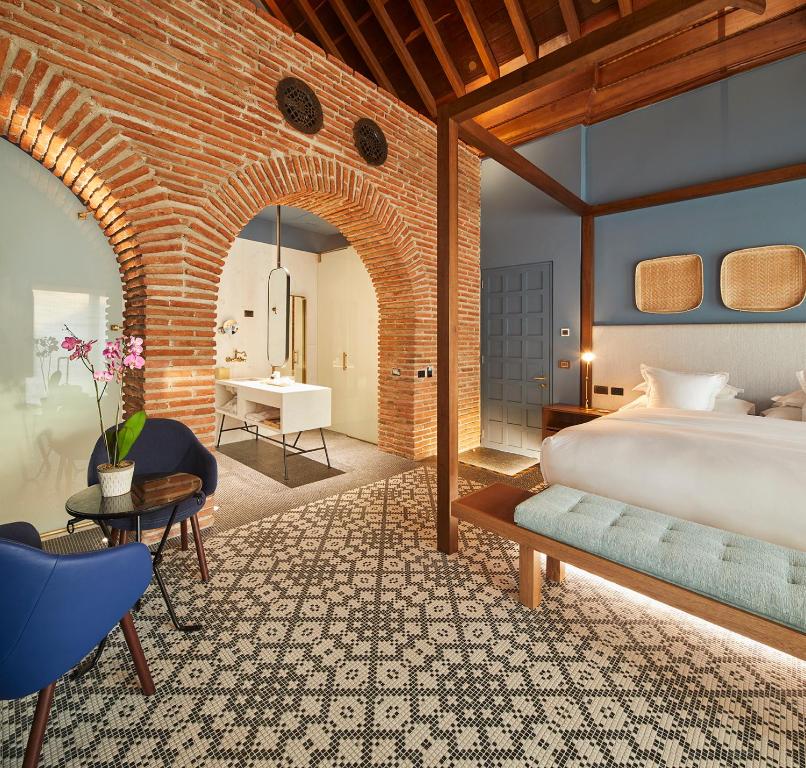 Postel nebo postele na pokoji v ubytování Hotel Boutique Casona del Colegio