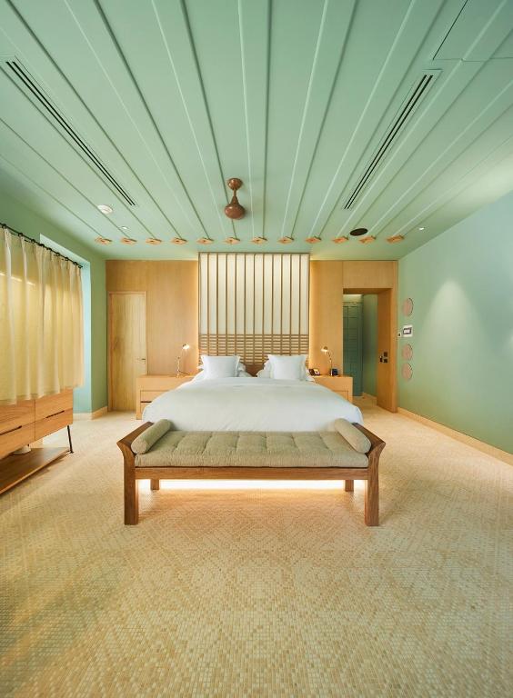 Postel nebo postele na pokoji v ubytování Hotel Boutique Casona del Colegio