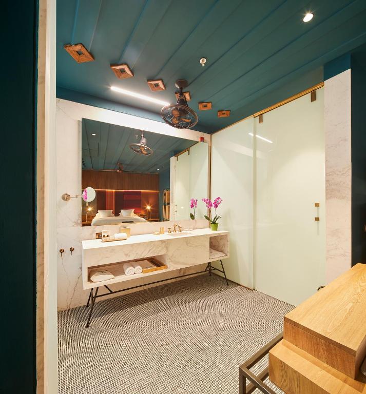 Postel nebo postele na pokoji v ubytování Hotel Boutique Casona del Colegio