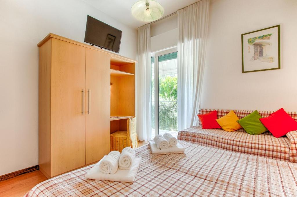 Postel nebo postele na pokoji v ubytování Hotel Venezia e la Villetta