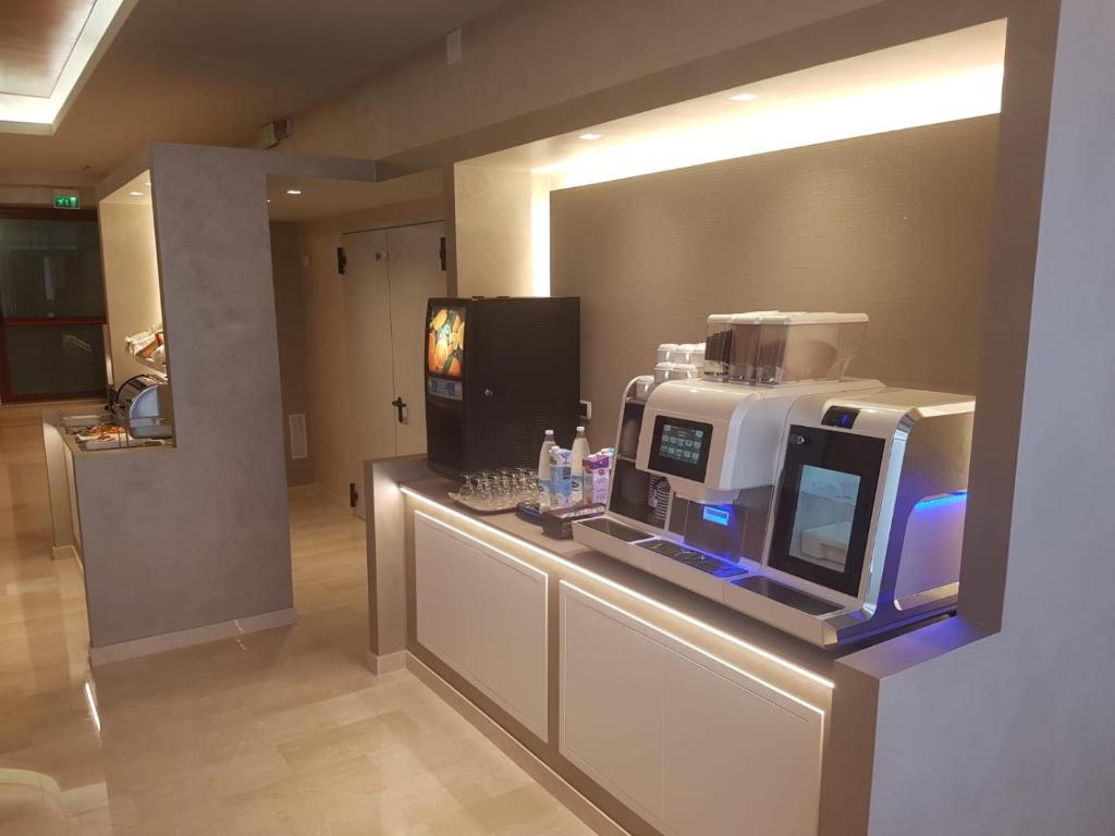 Kuchyň nebo kuchyňský kout v ubytování Hotel Adele