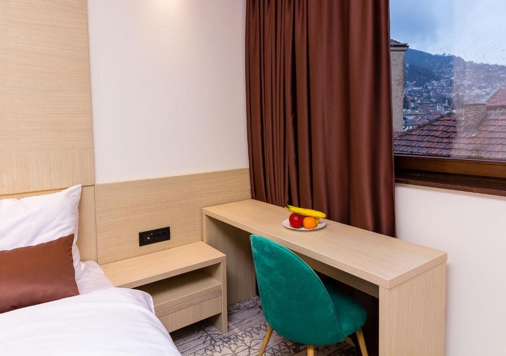 Uma cama ou camas num quarto em Hotel Boss