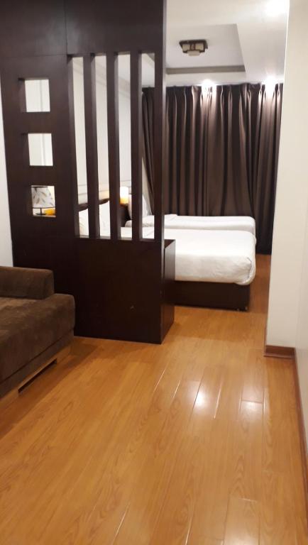 Rising Dragon Legend Hotel - Deluxe Triple Room