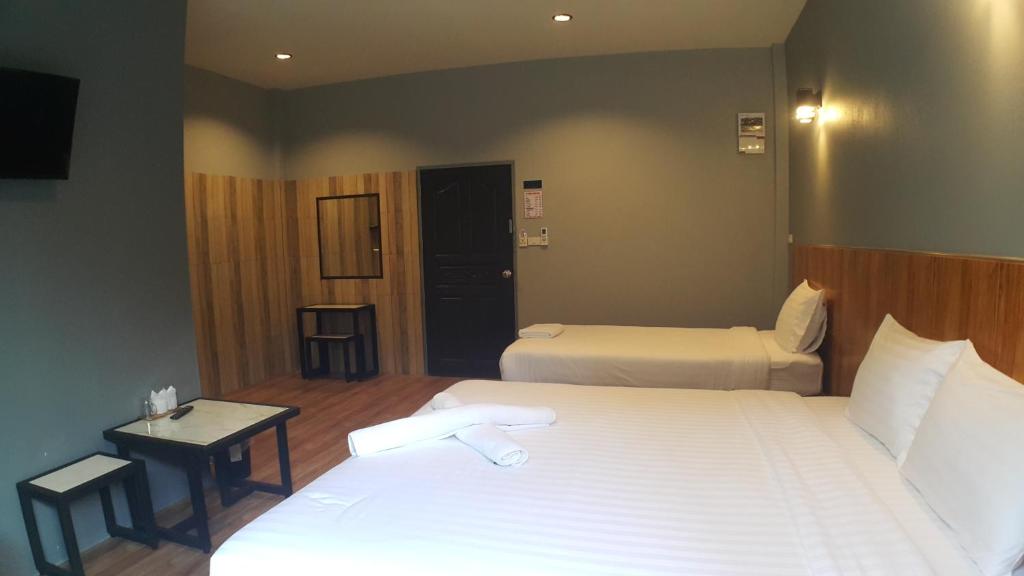 Postel nebo postele na pokoji v ubytování Zea Zide Hotel
