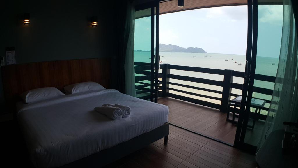 Postel nebo postele na pokoji v ubytování Zea Zide Hotel