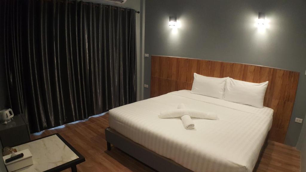 Postel nebo postele na pokoji v ubytování Zea Zide Hotel