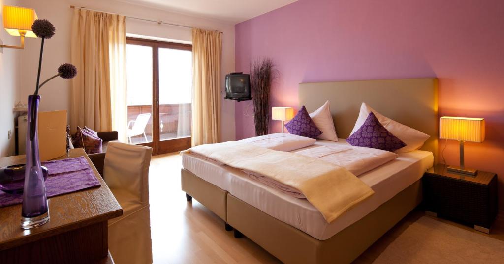 Postel nebo postele na pokoji v ubytování Hotel & Appartement Valtnaungut