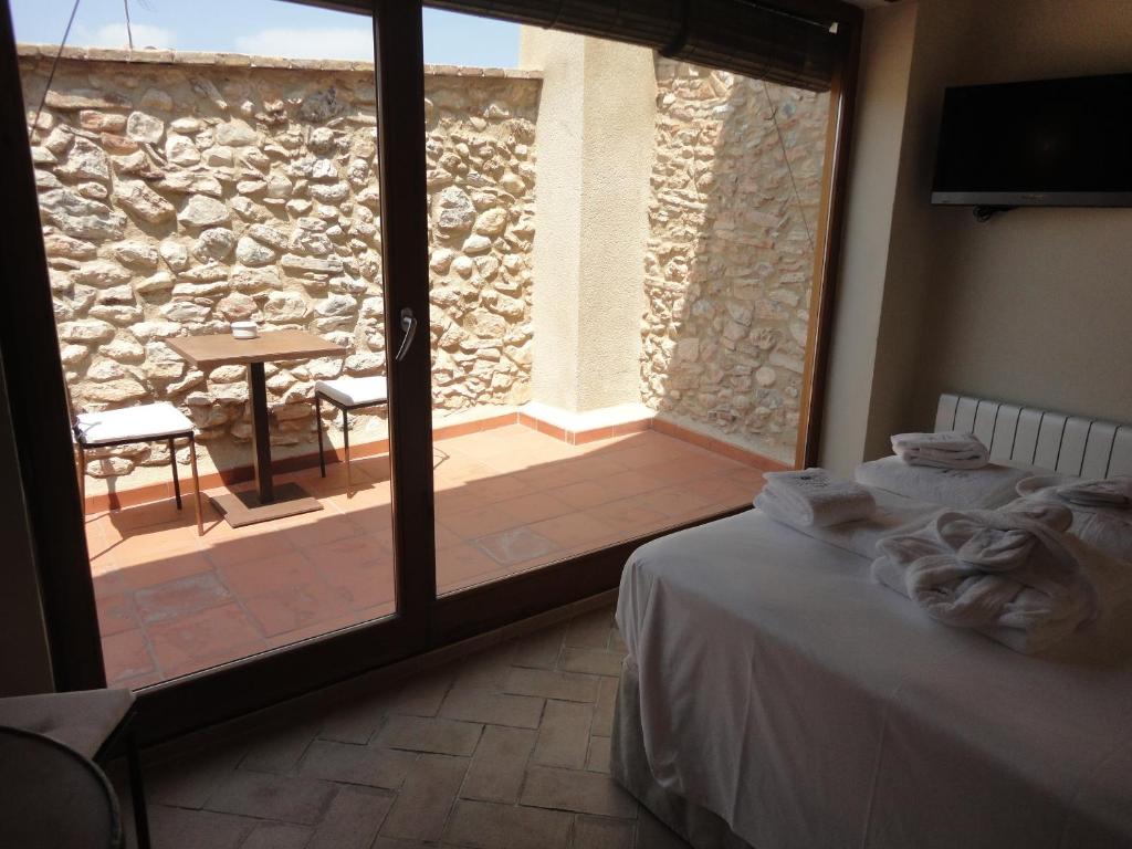 Postel nebo postele na pokoji v ubytování Hotel Rural Cal Torner Adults Only
