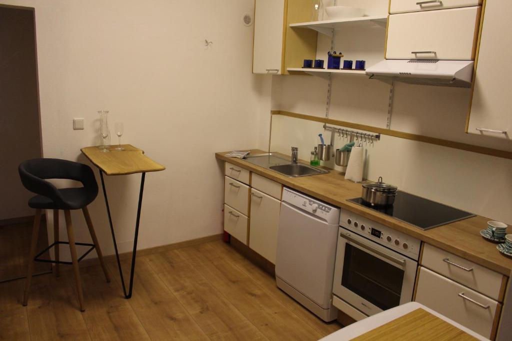 a small kitchen with a sink and a stove at Haus Nothnagl in Spitz