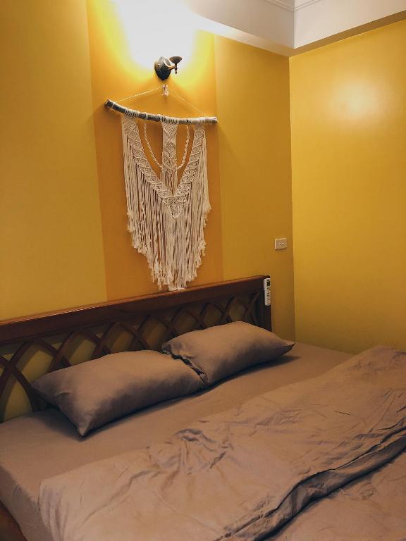Postel nebo postele na pokoji v ubytování Cactus Homestay
