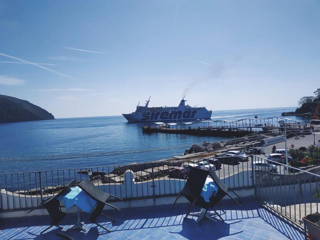 a large ship is docked at a dock at Lo Nardo Accommodation in Lipari