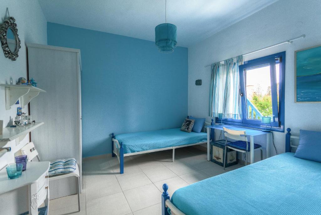 Posteľ alebo postele v izbe v ubytovaní Navy Greece Villa with swimming pool & sea view