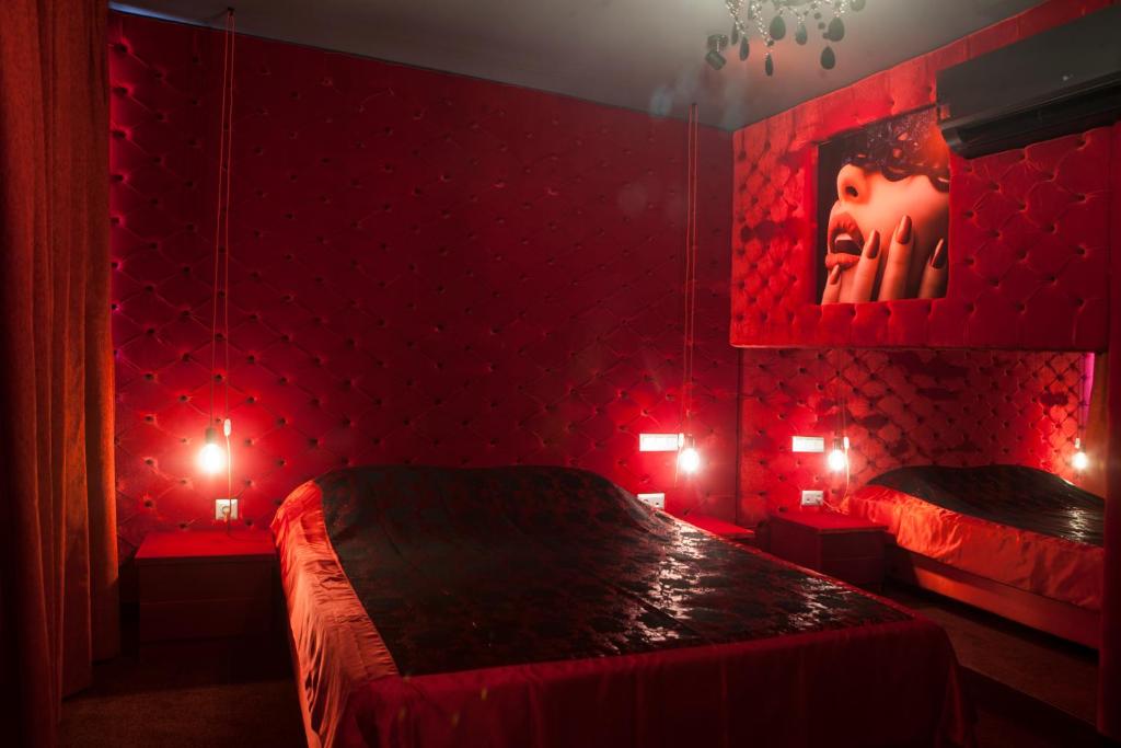 A bed or beds in a room at Madison