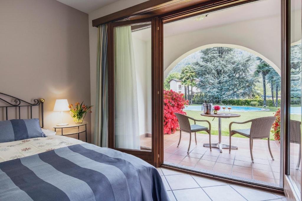 A bed or beds in a room at Garni Elena