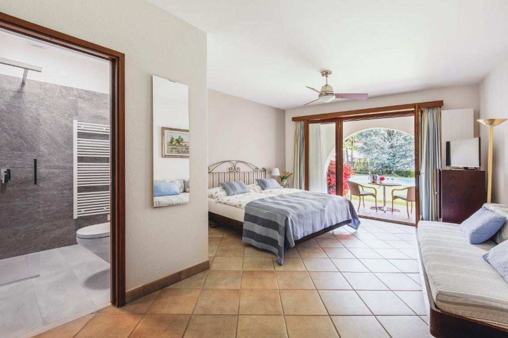 A bed or beds in a room at Garni Elena