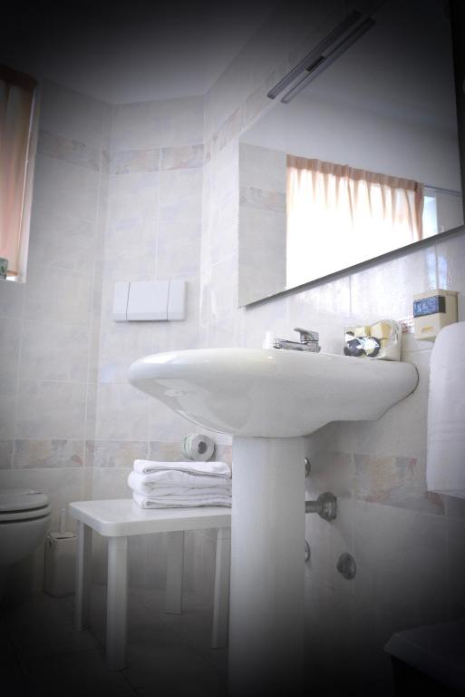 Koupelna v ubytování Hotel Pinamonte