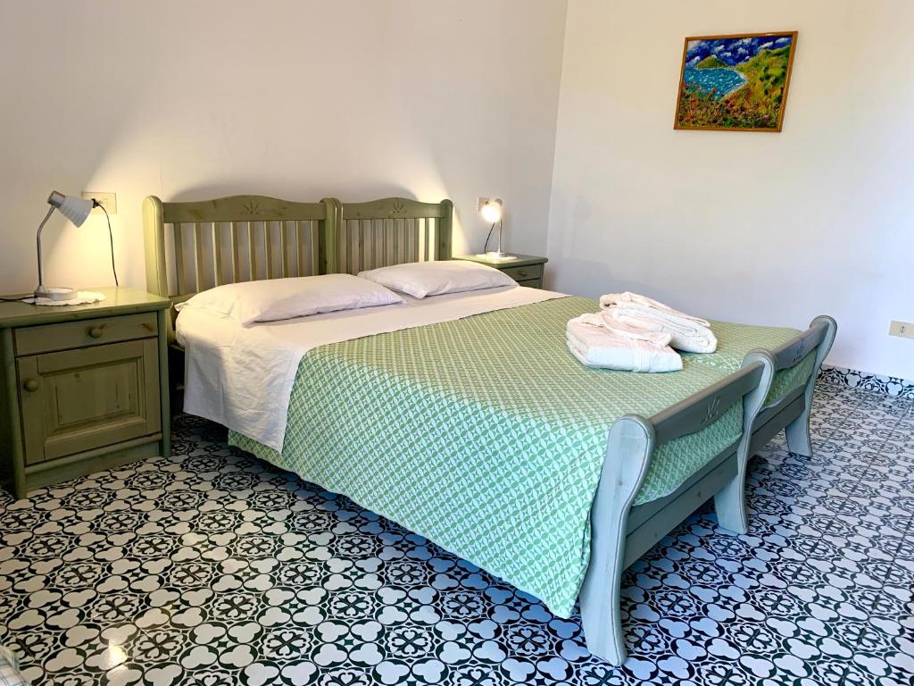 Postel nebo postele na pokoji v ubytování Villa Egidio