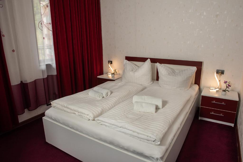 Llit o llits en una habitació de Guest House VIP