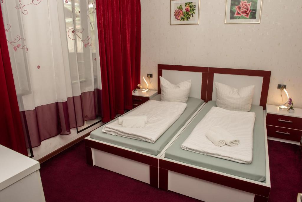 Llit o llits en una habitació de Guest House VIP