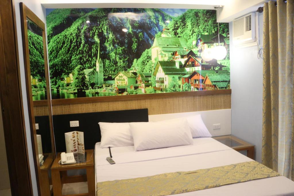 Postel nebo postele na pokoji v ubytování Eurotel Boracay