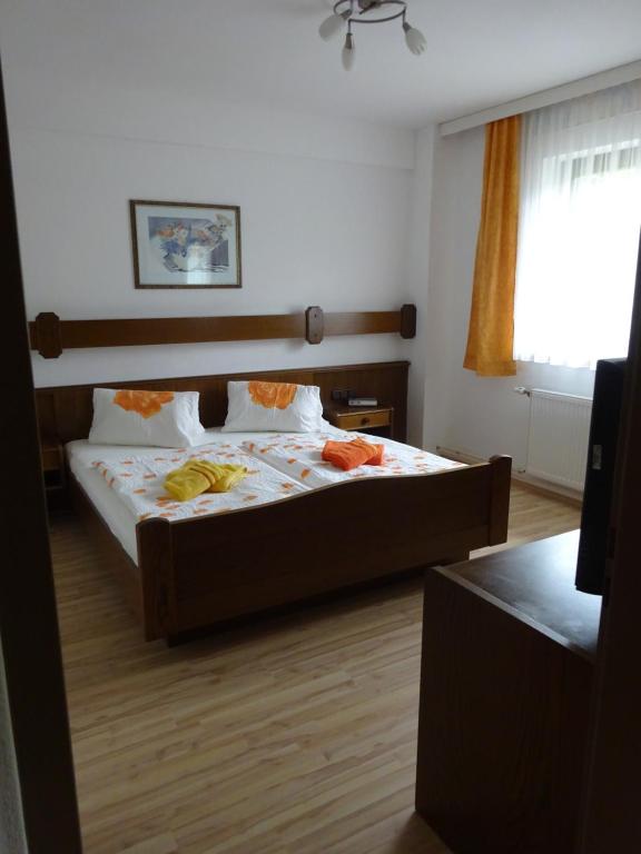 Postel nebo postele na pokoji v ubytování Appartement - Ferienwohnungen - Gästehaus Gabriele