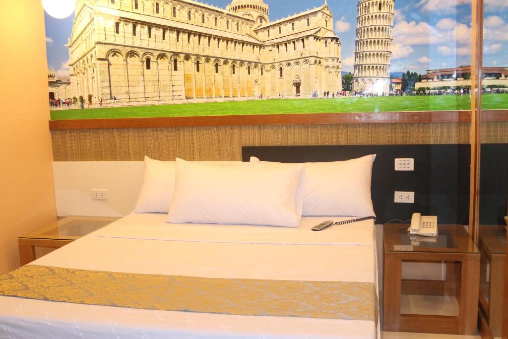 Postel nebo postele na pokoji v ubytování Eurotel Boracay
