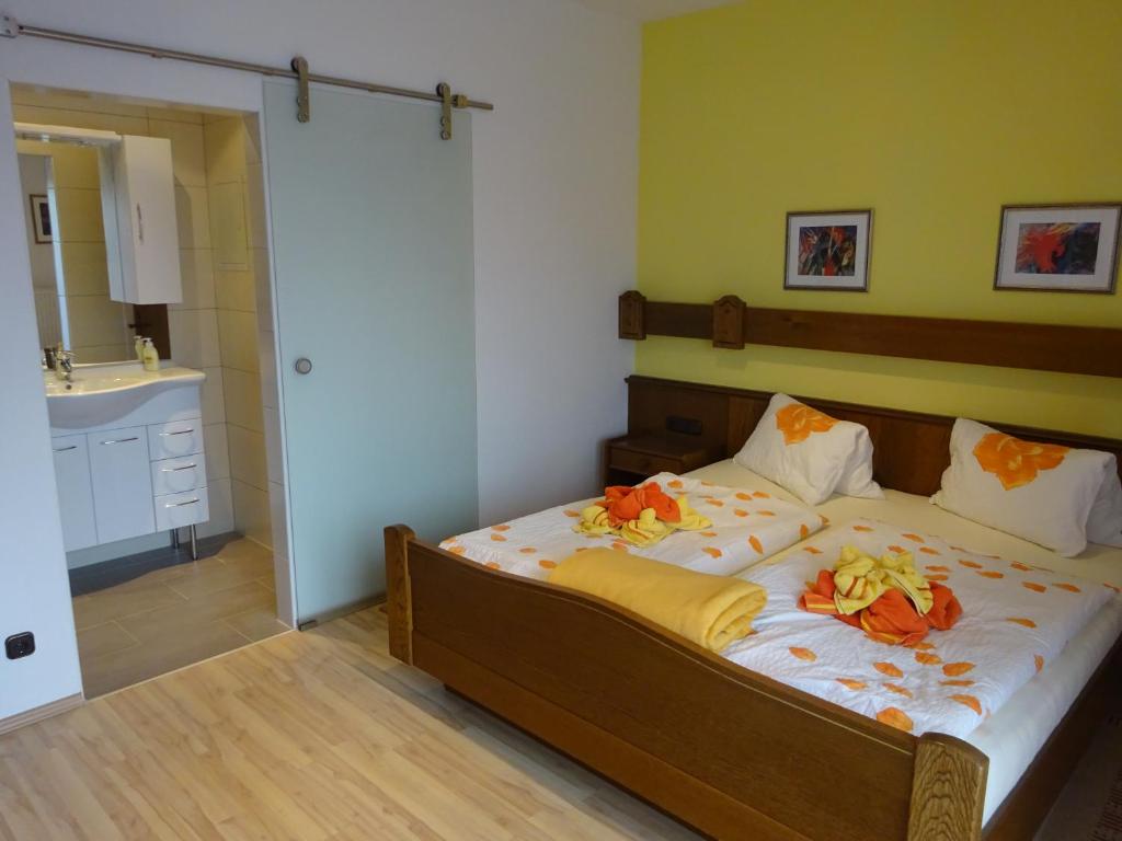 Postel nebo postele na pokoji v ubytování Appartement - Ferienwohnungen - Gästehaus Gabriele