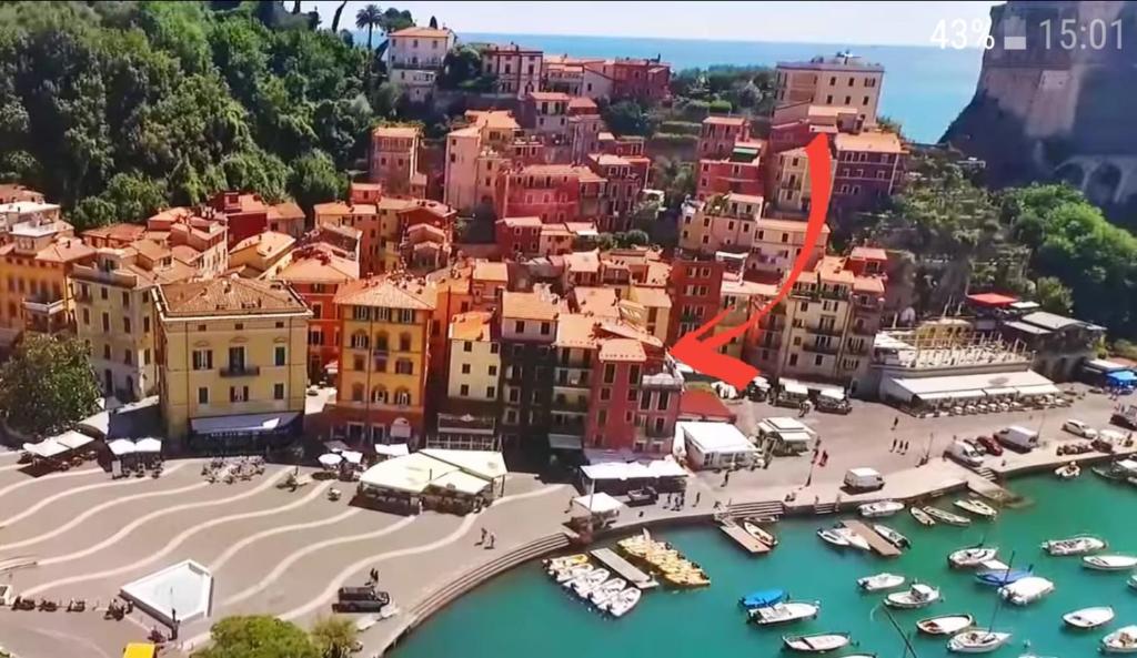 an aerial view of a city with boats in the water at Appartamento Tipico Sul Molo in Lerici