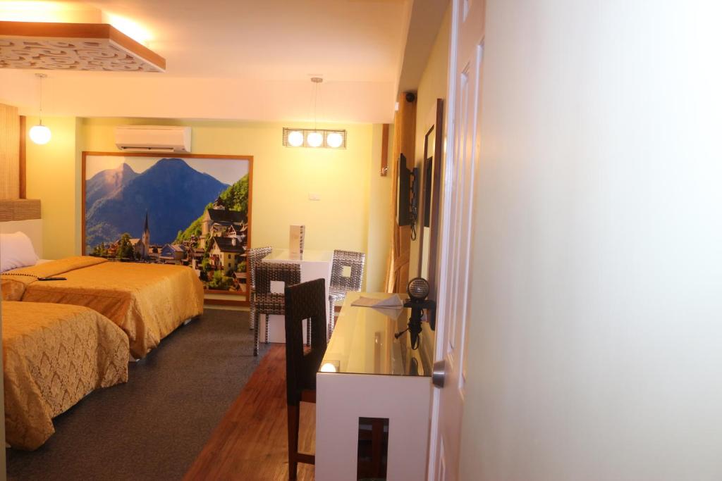 Postel nebo postele na pokoji v ubytování Eurotel Boracay