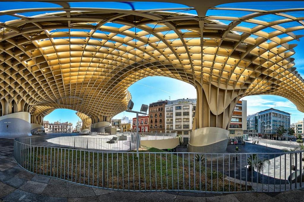 a pavilion in a city with buildings in the background at Apartamento Suite Las Setas in Seville