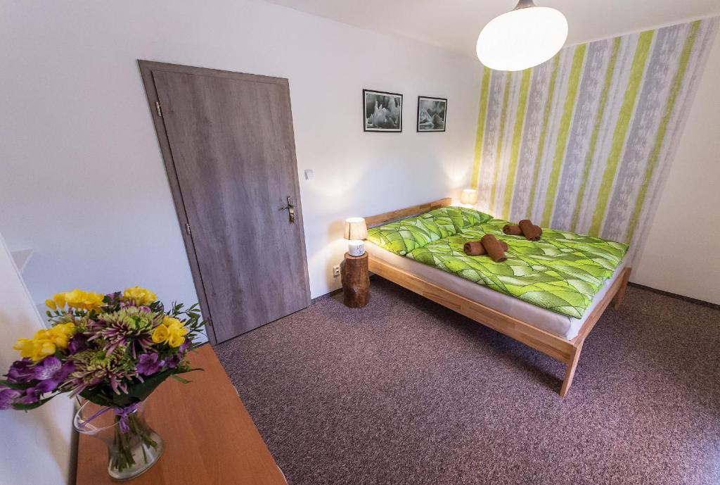 Postel nebo postele na pokoji v ubytování Penzion TOP