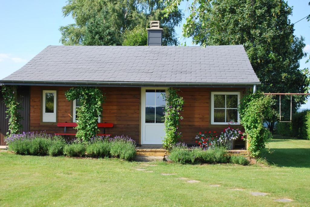 Zahrada ubytování Le Chalet à Bonnerue