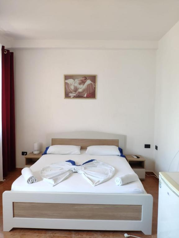Postel nebo postele na pokoji v ubytování Hotel Bolonja