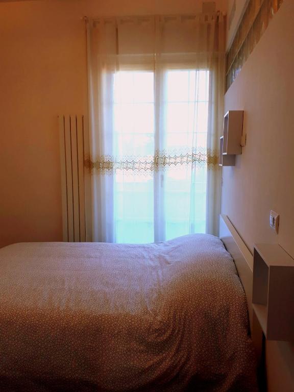 Postel nebo postele na pokoji v ubytování Casa Magnolia