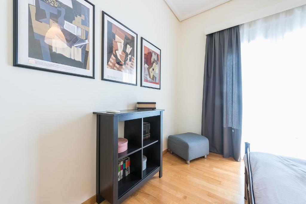 Łóżko lub łóżka w pokoju w obiekcie ATHENStay Penthouse Suite