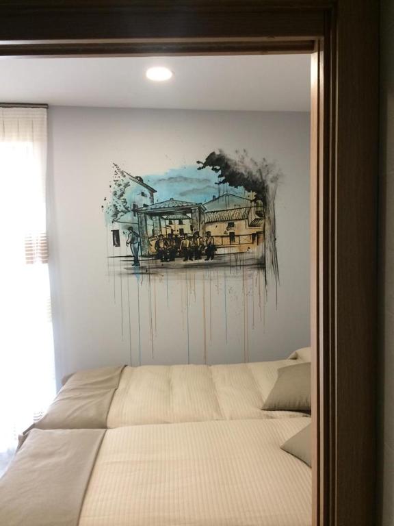 Postel nebo postele na pokoji v ubytování Hostal Rural Villa de Mendavia