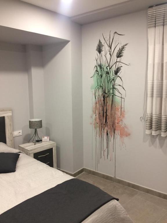 Postel nebo postele na pokoji v ubytování Hostal Rural Villa de Mendavia