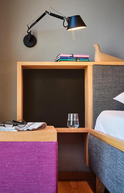Postel nebo postele na pokoji v ubytování Gud Jard Lodge Nr 24 - Design-Ferienhaus mit exklusiver Ausstattung