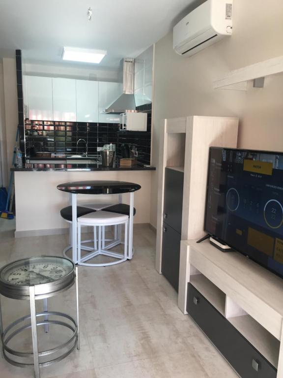 Kuchyň nebo kuchyňský kout v ubytování Luxury Apartamento Minerva Júpiter