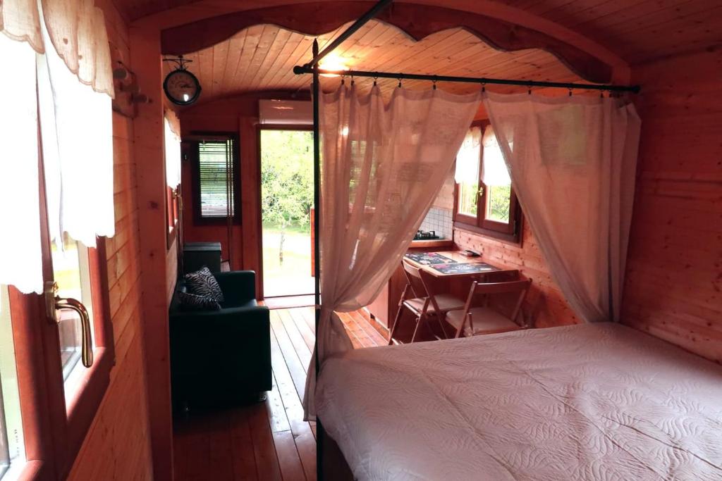 Postel nebo postele na pokoji v ubytování I Tre Abeti - Holiday House