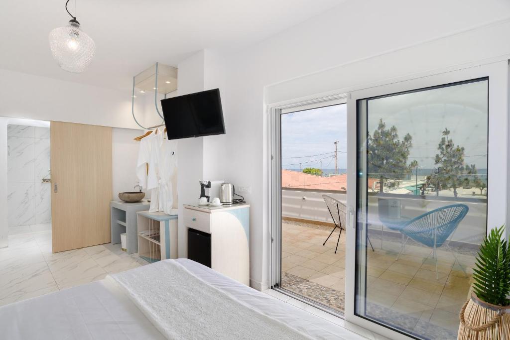 Postel nebo postele na pokoji v ubytování Mylos Luxury Escape