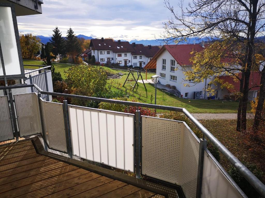 a balcony of a house with a white fence at Traumblick in Kempten