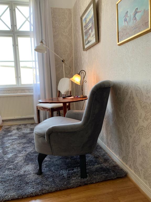 Posezení v ubytování Grenna Hotell