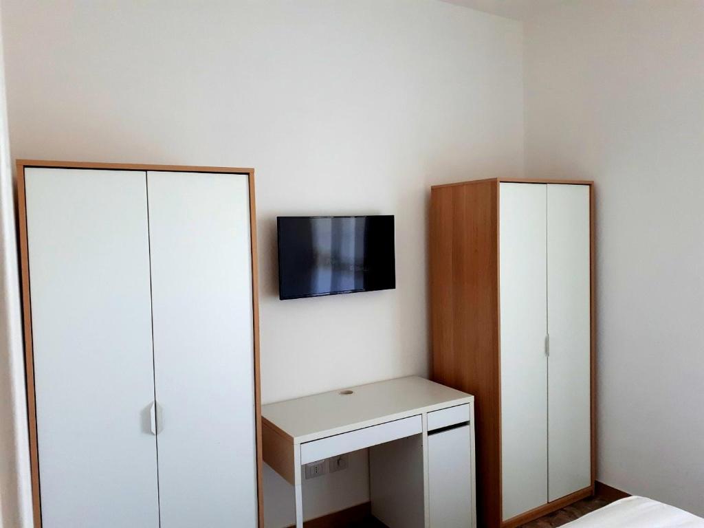TV a/nebo společenská místnost v ubytování Casa Magnolia