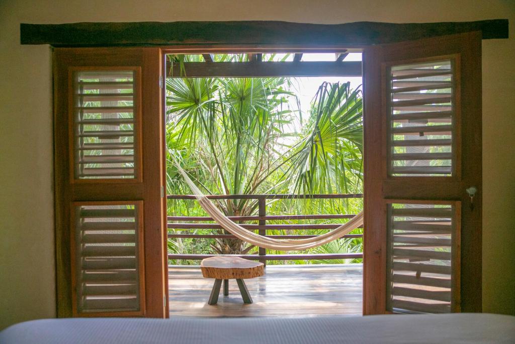 Balkón nebo terasa v ubytování Hotel Buenavista Bacalar Jungle Experience