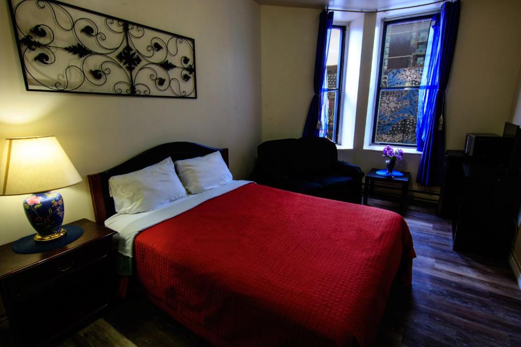 Postel nebo postele na pokoji v ubytování Hotel Casa Bella